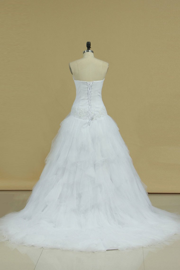 2024 Tulle Wedding Dresses Strapless With Applique And Ruffles Court